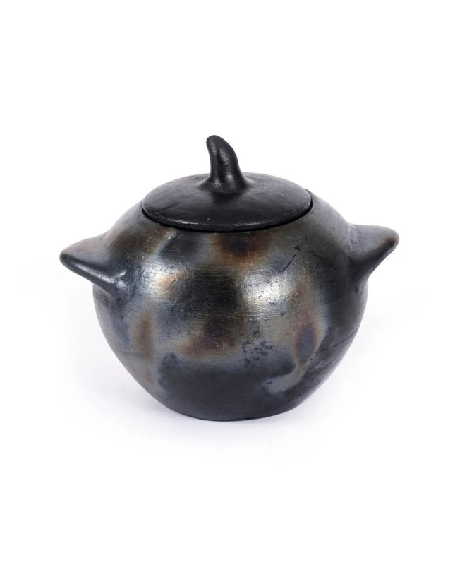 De verbrande pot - L