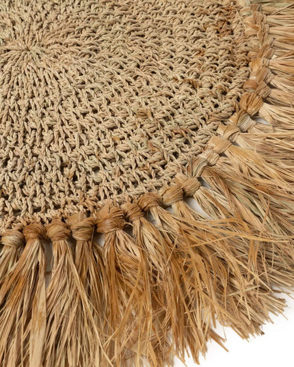 De gehaakte placemat van raffia - naturel